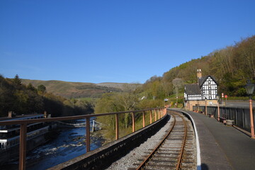 looking down the rail track from Berwyn station towards Llangollen in the welsh countryside