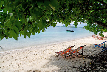 Seascape of couple Red Beach Chair on the sand beach at koh kham island sattahip chonburi thailand. Beautiful Nature Relax and Travel sightseeing 