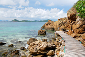 Seascape Wood bridge on coast of the clear sea at koh kham island sattahip chonburi thailand -...