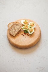 Eggs stuffed with tuna, parsley and onion. Tuna stuffed deviled eggs. 