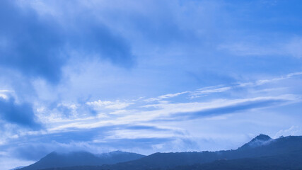 mountains with big blue cloud sky