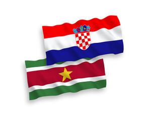 Flags of Republic of Suriname and Croatia on a white background
