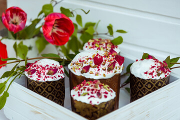 easter basket with eggs and flowers