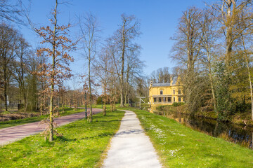 Fototapeta na wymiar Walking path on the grounds of the Nienoord estate in Leek