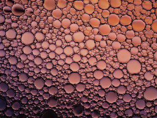 Oil bubbles on the water surface
