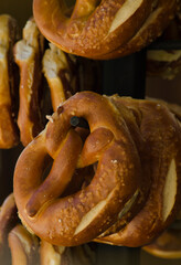 bretzel, pretzel or salty bow, biscuit or bun that is baked and twisted into a bow with a slightly salty flavor.