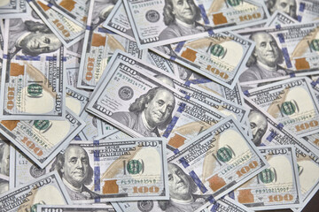 100 USD banknotes lots of background texture close up money