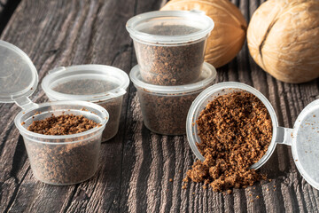 Several cans of walnut scrub on the table