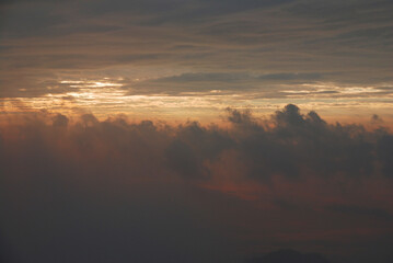 Nature scene landscape of Fog and Misty in the valley with light of sunrise in the morning of winter season at Phu Chi Fa , Chiangrai , Thailand 