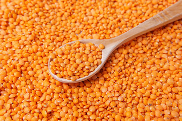 Organic red lentils for healthy food. background texture