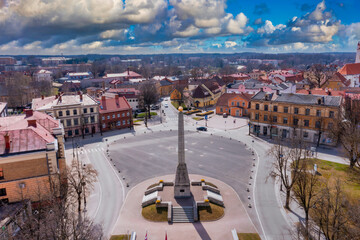 Drone aerial view of medieval old city. One of the beautiful town in Europe. Landscape to the city center and its historical buildings and old castle ruins.