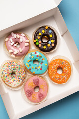 Colorful doughnuts in a box
