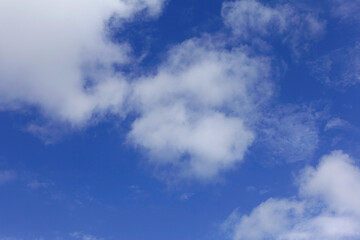 Beautiful white clouds on blue sky background.