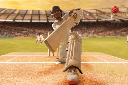 Batsman Hitting the Ball During Cricket Match In Stadium	