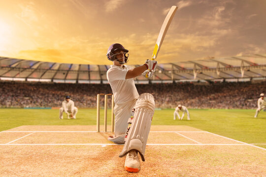  Batsman Hitting the Ball During Cricket Match In Stadium	