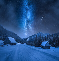 Milky way over snowy Chocholowska valley at night, Tatra Mountains