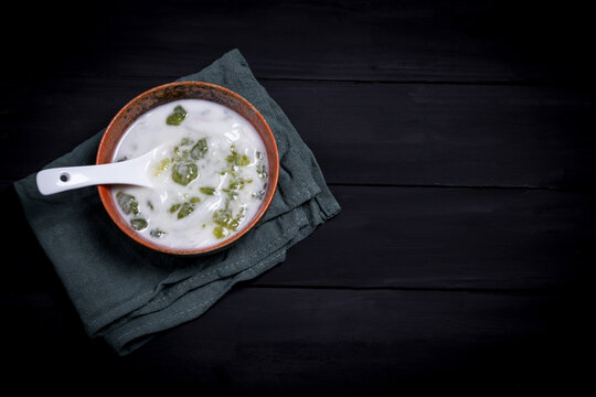 Thai dessert (Inthanin), green powder with young coconut and coconut milk