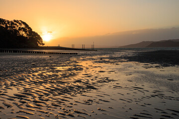 Sunset and pier - New Zealand