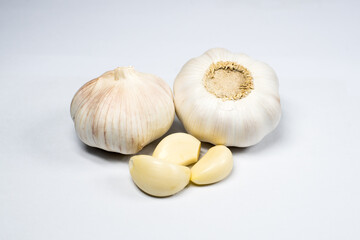 Raw Garlic on white background