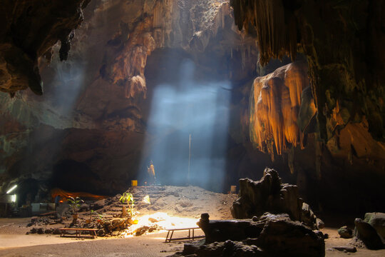 Amazing Buddhism with the ray of light in the Chom Phon cave, Ratchaburi,Thailand