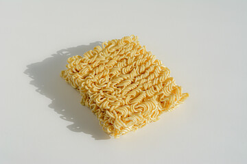 Dry Chinese instant noodles, close-up. Harmful food. Food for the road.