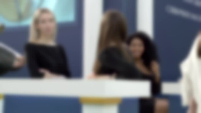 Blurred image of silhouettes of young and beautiful girls.