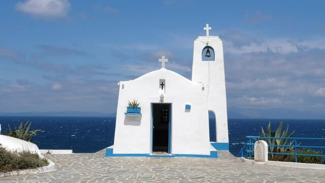 Small White Chapel next to the Blue Sea, Agios Nikolaos Rafina Greece.