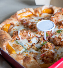 Closeup Supreme Pizza lifted slice