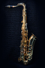 Saxophone jazz instruments. Alto sax isolated. Saxophone music instrument closeup on black                               
