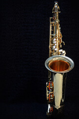 Saxophone jazz instruments. Alto sax isolated. Saxophone music instrument closeup on black                               