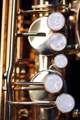 Saxophone jazz instruments. Alto sax isolated. Saxophone music instrument closeup on black                              