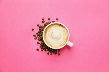 Cup of hot cappuccino on color background