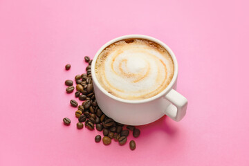 Cup of hot cappuccino on color background