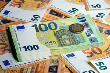 Fototapeta na wymiar Dollar closeup. Money macro. A stack of cash in a silver clip. European currency. Money background 