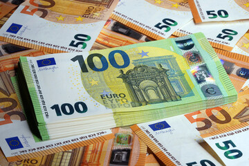 Euro close-up. Macro of money. Cash banknotes are stacked. European currency. Money background                                