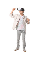 Young man with virtual reality glasses on white background