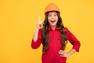 happy kid girl in protective helmet raised finger with idea, inspiration