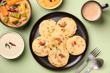 South Indian breakfast rava idli or semolina idly , Suji idly with coconut chutney. Very popular dish in Kerala, Tamil Nadu, India , Sri Lanka.  healthy Steamed food 