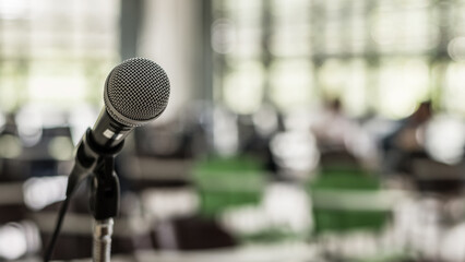 Microphone voice speaker in business seminar, speech presentation, town hall meeting, lecture hall or conference room in corporate or community event for host or townhall public hearing - obrazy, fototapety, plakaty