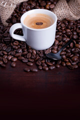 cup of coffee with beans