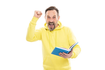 happy adult guy reading planner. agenda. literature education. mature man with beard hold notebook