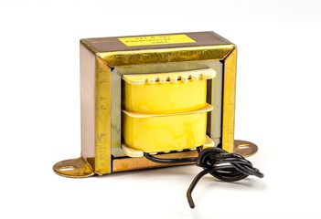 Close up view, transformer of electrical device for transformation of voltage isolated on white background.