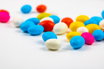 Selective focus of candies on white background. colorful candies in focus. Candy background photo. 
