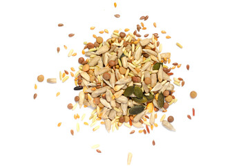Mixed dry organic cereal and grain seed pile on white background, for clean food ingredient or agricultural product concept