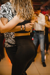 Kharkiv, Ukraine 08.04.21 couple dance bachata salsa dance with beautiful hands. Young sporty girls...