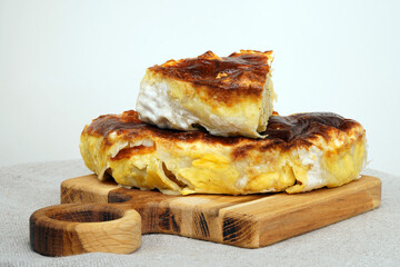 Round ruddy meat pie. Homemade baking. Healthy food. Bakery products. Dough product.  Loaf with minced meat. Puff cake, hot dish, dough product 
                                             