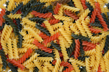Spiral pasta background. Close-up of raw spaghetti, italian food. Garnish. Flour products. Paste.                           