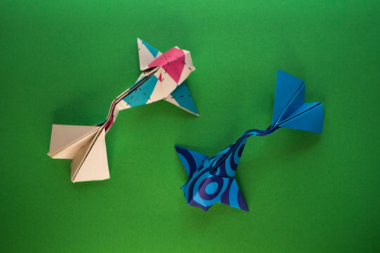 Origami Koi Fish On A Green Background