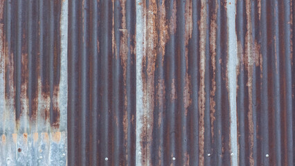 Rusted zinc, taken as a background behind the mill.