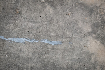 Concrete wall with cracks in industrial building, great for your design and texture background.